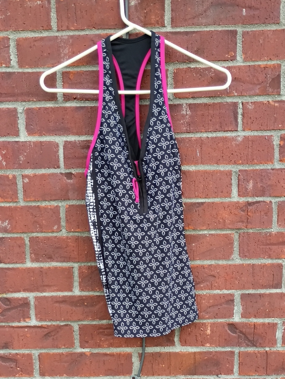 Beach House Black One-Piece with Pink Trim and White Floral Pattern